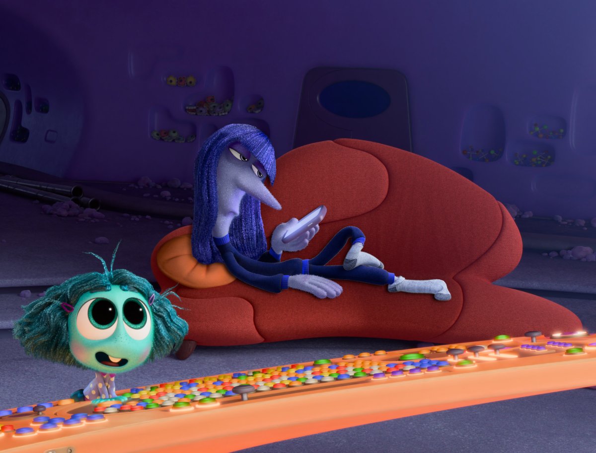 inside out character glued to phone